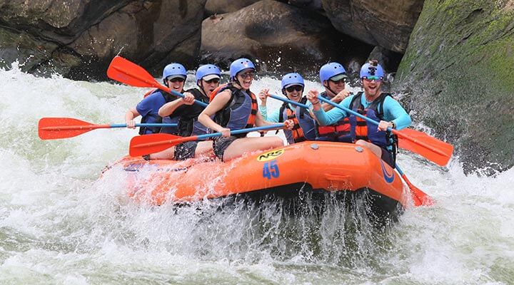 A whitewater rafting group travelling on adventure holidays through canada.