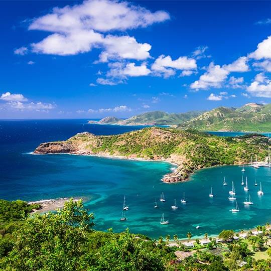 A view of the harbour in Antigua, with boats and yachts in the bay.