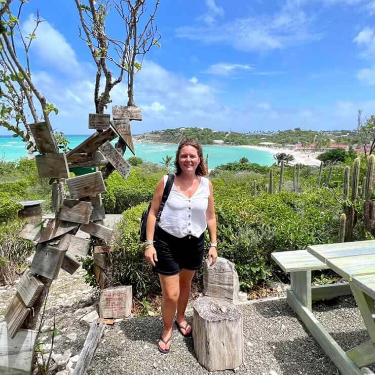 On holiday in Antigua, standing in front of the port.