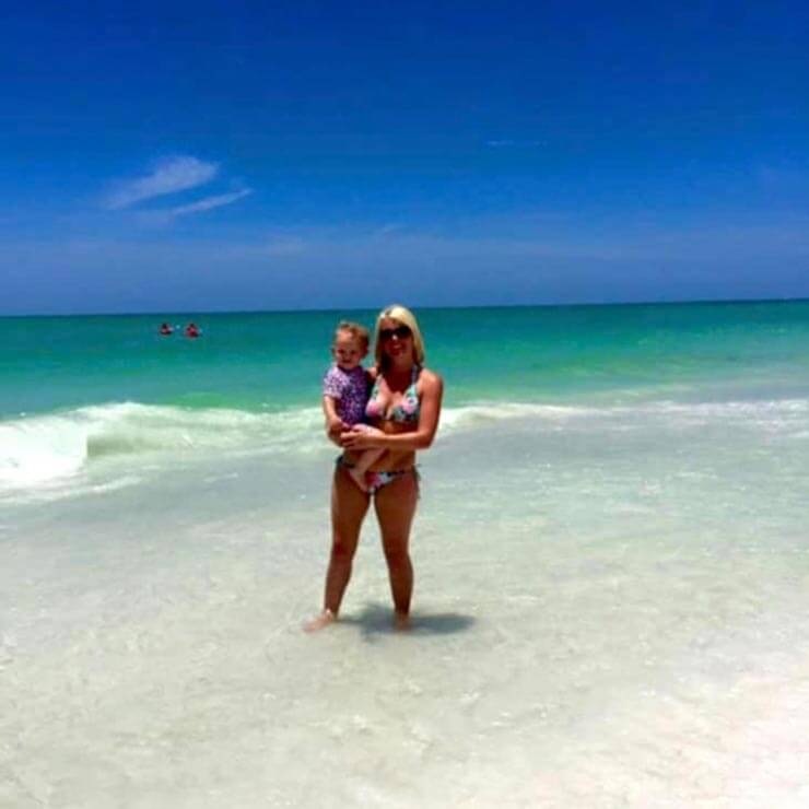 Standing in the surf at the beaches in florida on a family holiday.