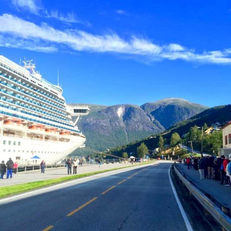 A large cruise liner ready to embark on a tour of the fjords of norway.