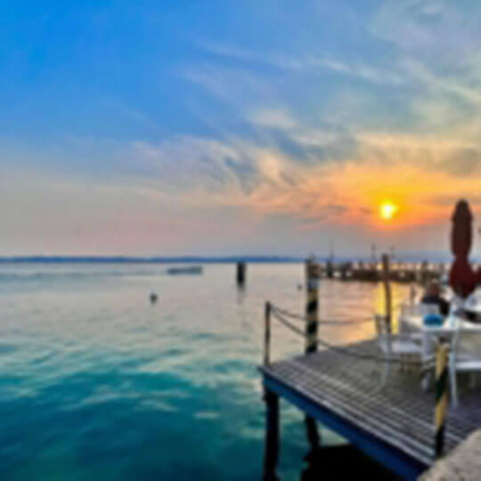 sunset views over the water in Lake Garda.