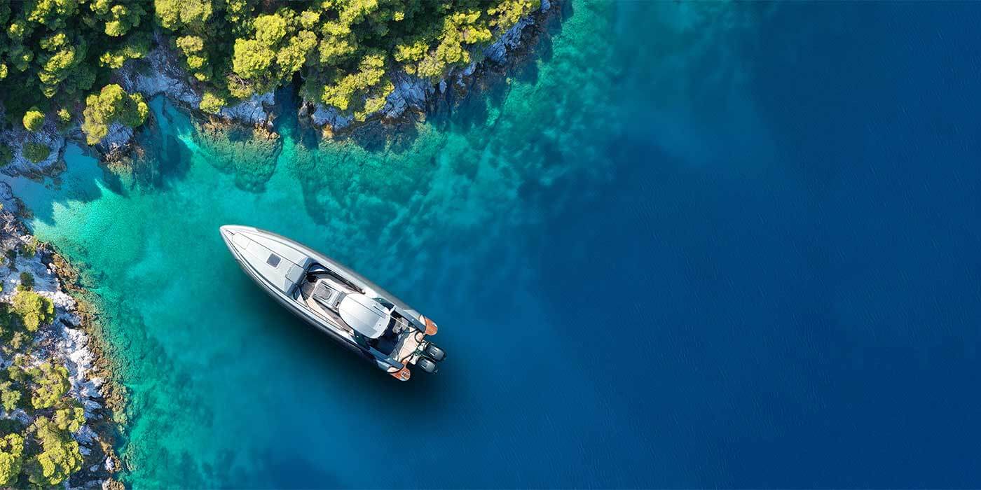 A luxury yacht docked at an exotic private island for a once in a lifetime holiday.