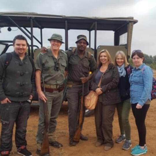 A group of safari holiday makers on the tour in africa.