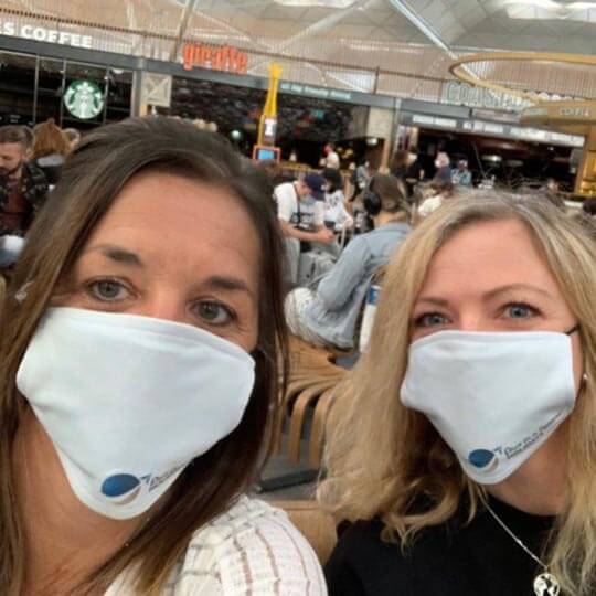Wearing masks to travel during covid.