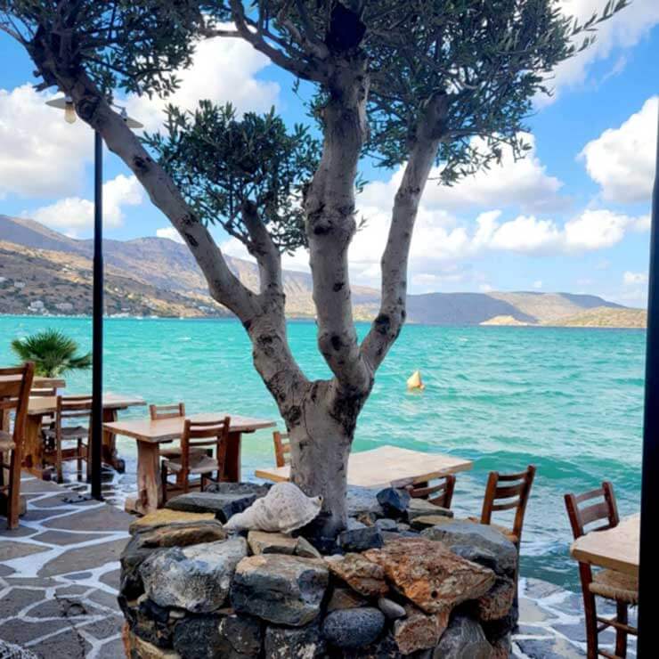 Gorgeous outdoor dining area overlooking the aegean seas in crete.