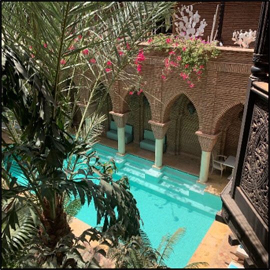 View of the pool at holiday resort in Marrakech.
