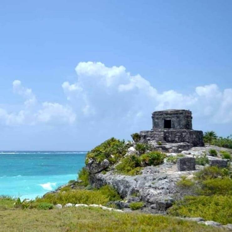 Ruins of old buildings in Mexico, close to the ocean.