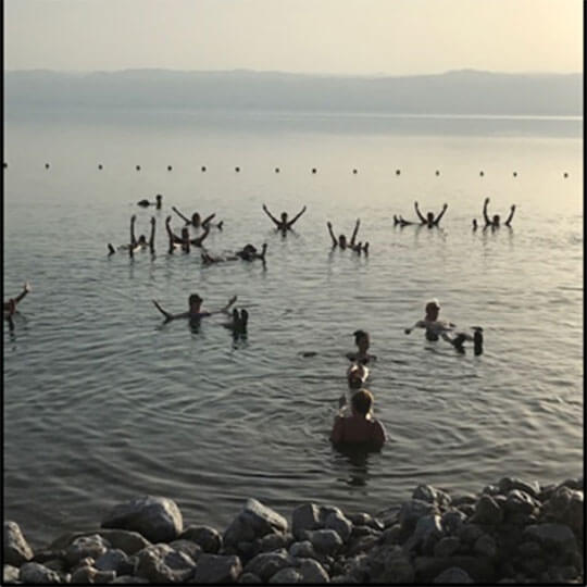 Swimming in the dead sea in Jordan.