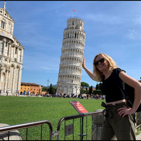 Getting the iconic photo at the leaning tower of pisa.