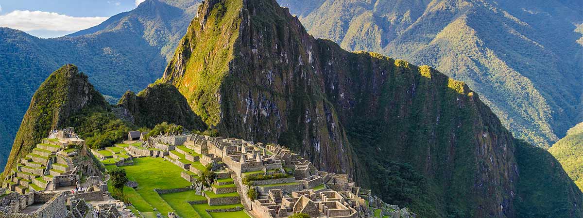 The majestic landscape of macchu pichu ona holiday to peru, with mountains framing the inca trail.