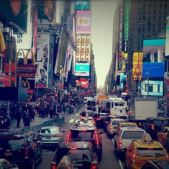 The famous sights and lights of time square on holiday in new york.