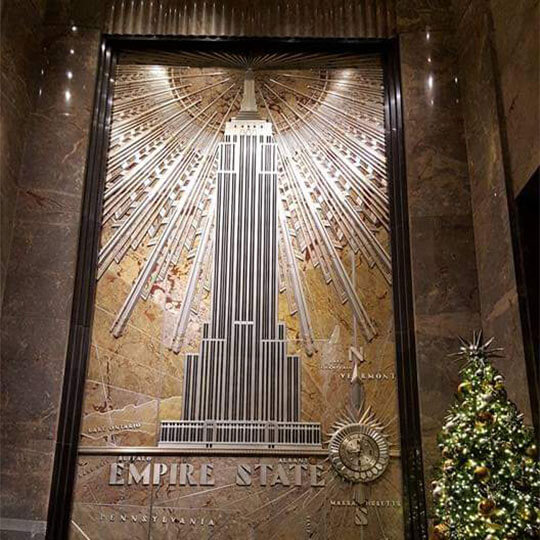 Plaque of the empire state building in new york.