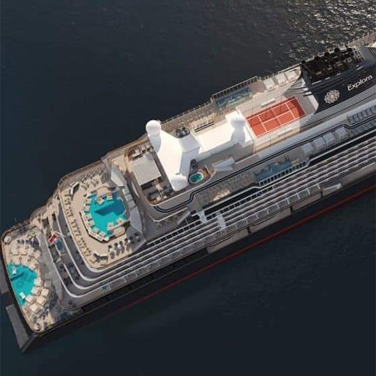 An aerial view image of the majestic explora journey cruise ship sailing to the caribbean sea.
