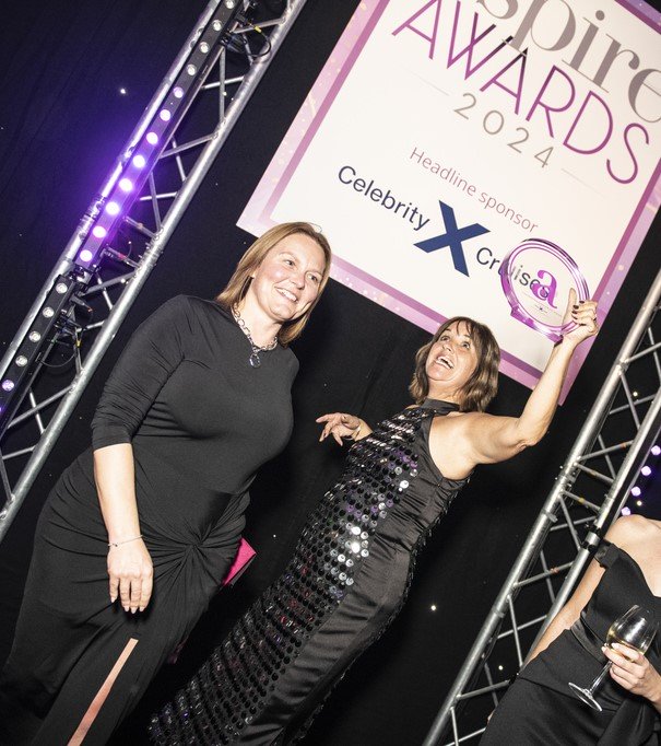Once in a Lifetime Holidays team receiving UK's Best Small Luxury Business 2024 award